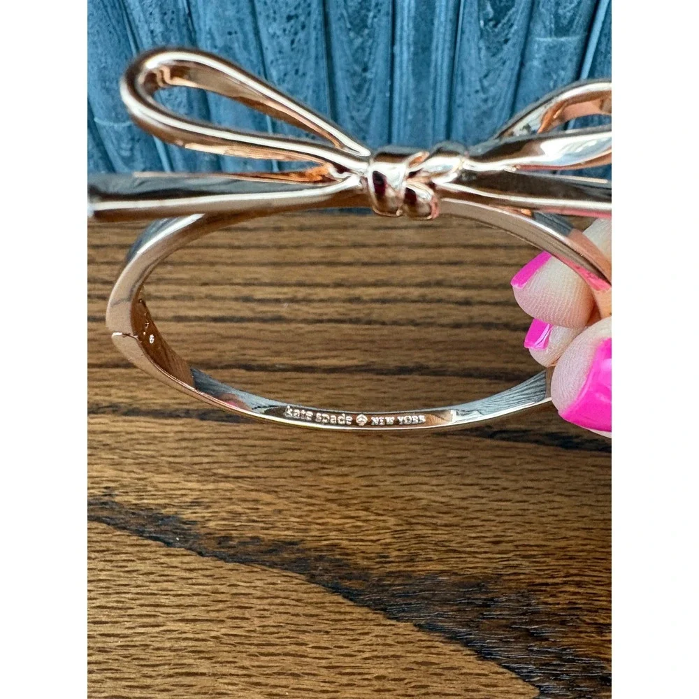 Kate Spade New York Skinny Bow Bangle Bracelet Rose Gold Tone Hinged Cuffs